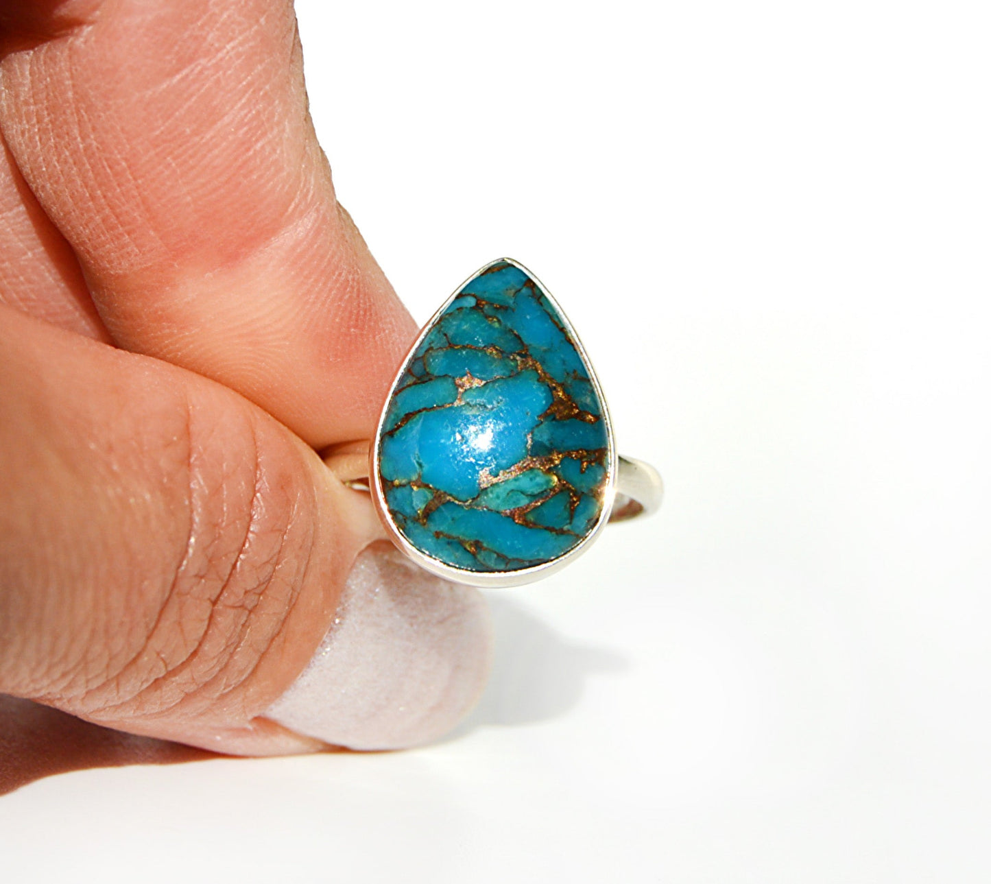 Turquoise copper ring made of sterling silver