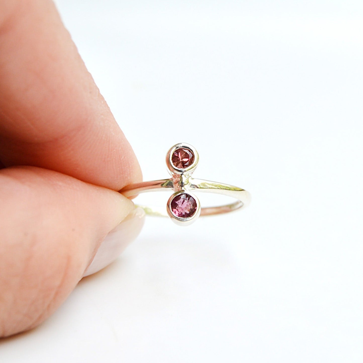 JeniMarie Jewelry watermelon tourmaline ring set in sterling silver. Features two stones with a comfort band ring. 
