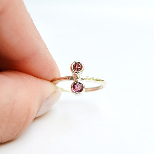 JeniMarie Jewelry watermelon tourmaline ring set in sterling silver. Features two stones with a comfort band ring. 