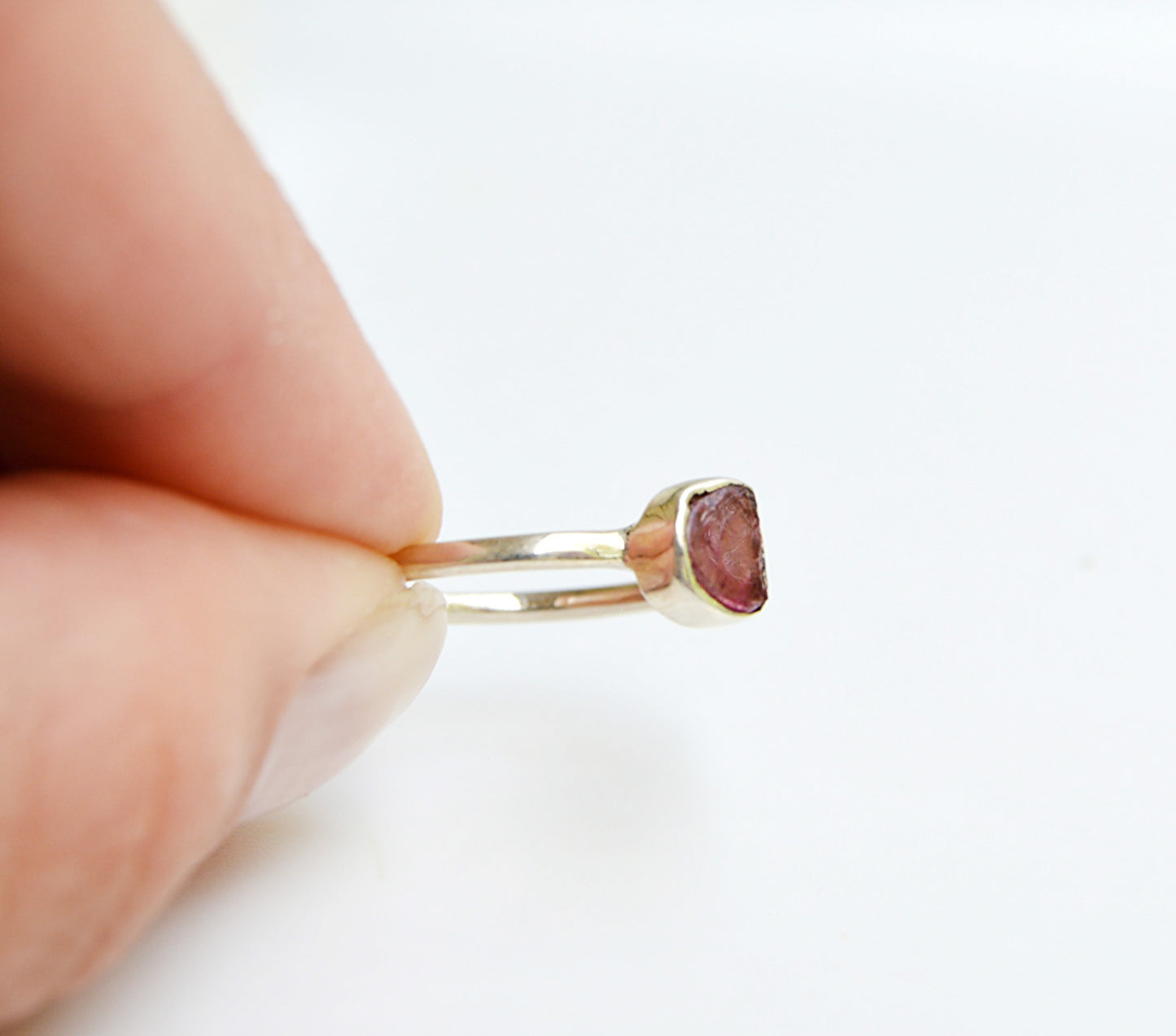 JeniMarie Jewelry showing a watermelon tourmaline in a rare cut stone tube set in sterling silver .925 making the piece hypoallergenic. 
