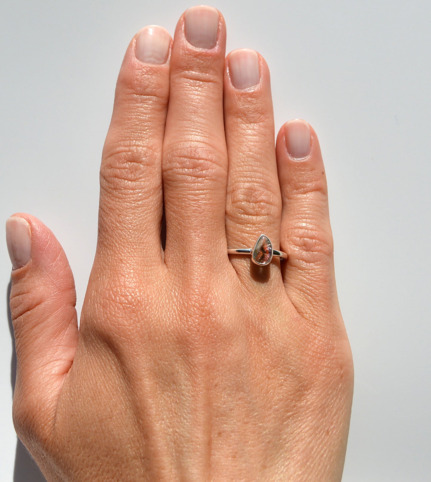 JeniMarie Jewelry with a handcrafted watermelon tourmaline ring with a comfort band and high polish for extra shine. 