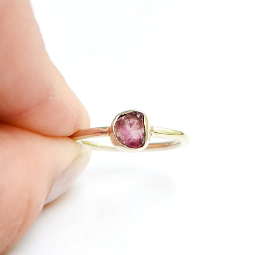 JeniMarie Jewelry showing a rare cut watermelon tourmaline ring set in .925 sterling silver making the ring hypoallergenic. 